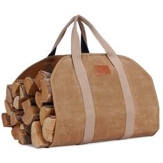 a large bag filled with wood stacked on top of each other in front of a pile of logs