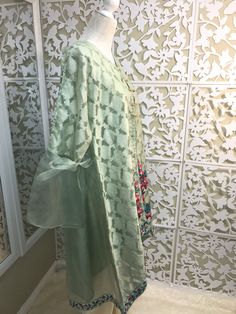 Very chic mint green jamawar on organza jacket, with bell sleeves and floral embroidery, it comes with silk matching inner, and ivory bell bottom. Brand: Bonita, Chen One Shipping USPS 2 day Spring Designer Tissue Silk Kurta, Spring Embroidered Tissue Silk Kurta, Designer Tissue Silk Kurta For Spring, Spring Anarkali Tissue Silk Kurta, Green Designer Dupatta For Spring, Spring Resham Embroidery Tissue Silk Kurta, Spring Tissue Silk Kurta With Resham Embroidery, Spring Tissue Silk Sets With Resham Embroidery, Designer Green Kurta For Spring