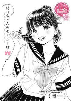 a girl in sailor's uniform is smiling