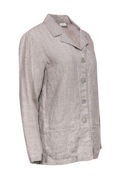 Add some chic minimalism to your closet with this linen top from Eileen Fisher! Made with large and in charge metallic buttons, this is a structured piece that is sure to be your new favorite. From the office, to the bar on the weekends, get ready to fall in love! Size M 100% Linen Scoop neckline with notch collar Front button closures Long sleeved Pockets at hip Waist 40" Sleeve 21.5" Total length 27" Spring Button-up Flax Tops, Elegant Linen Tops With Button Closure, Long Sleeve Linen Office Tops, Long Sleeve Linen Tops For Office, Flax Linen Top With Button Closure, Elegant Everyday Linen Tops, Classic Linen Tops With Snap Buttons, Casual Linen Blouse For Office, Casual Linen Office Blouse