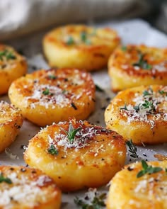 some food that is sitting on a plate with sprinkled parmesan cheese