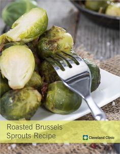 brussel sprouts on a plate with a fork