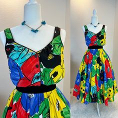 1980s dress / 80s dress / vintage 1980s dress / 1980s does 1950s dress / 1980s dress / vintage 1950s style dress / vintage sundress This 1980s sundress is amazing. First let me start by saying this is one of those simple dresses that has so much style. She is a sundress with a button front and a comfortable elastic waist band. But what I really love is her vibrant print and the full skirt with hidden pockets! Classic sundress cut, but with a gorgeous bold colors means you will never see anyone else in this dress! Truly a timeless dress made for fun!  Measurements provided are flat and have been doubled. Bust 36"  Waist 26-28" range  Hips free Length  48" ❤️ Condition: Excellent vintage condition. Flaw: none found. Belt in photos not included. This item has been cleaned and is ready to wear Summer Vintage Midi Dress, Vintage A-line Summer Dresses, Retro A-line Vintage Dress For Summer, Vintage Style Summer Midi Dresses, Vintage Style Midi Length Summer Dresses, Vintage Puff Sleeve Dress For Summer Party, Summer Party Vintage Dress, Summer Sleeveless Vintage 1950s Style Dress, Summer A-line Midi Dress For Vintage Fashion