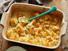 a casserole dish with cauliflower in it