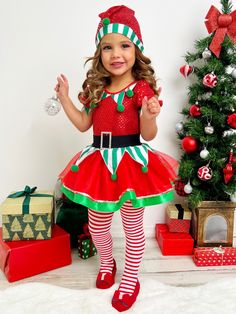 Your sweet elf will sparkle with joy in our sequin tutu dress. Dressing your merry munchkin in her holiday best has never been quite as fun as this. It's the most fashionable time of the year! Keeps its cuteness wash after wash Buttery-soft fabric for all-day comfort Perfect her Holiday party, formal event, pageant, pretend play, or pictures wardrobe Puff-sleeve elf tutu dress with pom-pom applique collar, sequin mesh bodice, velvet belt, striped fabric with pom-pom tassels, and a gathered tulle Christmas Pageant Wear, Pageant Wear, Velvet Belt, Toddler Flower Girls, Set Dressing, Girls Dress Outfits, Kids Christmas Outfits, Toddler Flower Girl Dresses