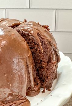 a chocolate bundt cake on a white plate