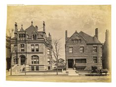 an old black and white photo of some buildings