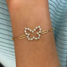 Talk about getting butterflies. The Little Posie Charlie Cloud® Floating Diamond Butterfly Bracelet is one of our most popular styles. This exquisite bracelet showcases a delicate floating butterfly design. With its precious symbolism and sparkling beauty, it is the perfect addition to any wrist stack. Metal: 14k White Gold / 14k Yellow Gold Two Tone: 14k White Gold Heart + 14k Yellow Gold Paperclip Chain Round Brilliant Cut Natural Diamonds: Approx. 0.70 ctw F/G Color and VS1 Clarity Diamonds L Getting Butterflies, College Rings, Diamond Butterfly, Mens Engagement, Butterfly Bracelet, Popular Styles, Band Bracelet, Gold Butterfly, Mens Band