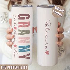 two white tumbles with the words grandma and grandpa printed on them, both being held by a woman