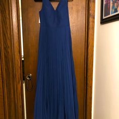 Navy Blue Pleated Floor Length Chiffon Dress With Split Front. Size 12 Perfect For Wedding Guest Or Bridesmaid. Vneck With Zipper In Back. Blue Chiffon A-line Maxi Dress, Blue Chiffon V-neck Bridesmaid Dress, Blue V-neck Dress With Pleated Bodice, Blue A-line Maxi Dress For Wedding Guest, Blue A-line Chiffon Evening Dress, Blue A-line Chiffon Dress For Wedding, Blue Chiffon Maxi Dress For Wedding Guest, Blue A-line Chiffon Wedding Dress, Blue Floor-length Chiffon Bridesmaid Dress