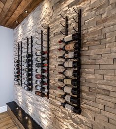 a wine rack is mounted on the wall