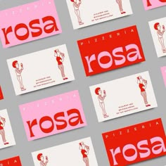 several business cards with red and white designs on the front, one for rosa