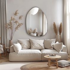 a living room filled with furniture and a round mirror