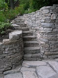 stone steps leading up to the top of a hill