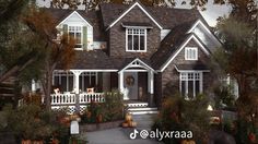 a large house with lots of windows and pumpkins