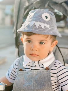 Are you looking for cloth for the little boy or a gift for your friend? This smart and casual-looking set is good for your little boy. Made of high-quality combed cotton material. The material is soft and highly absorbent, and it is gentle against a baby's skin. The set is inclusive of a cute monster hat, overalls, and a jumpsuit. It's easy to get dressed and take off with a button. It's the perfect gift for a birthday, Christmas, or any occasion. Influencer @baby.amarbizhdili Material: Cotton C Cotton Hat With Curved Brim For Playtime, Cotton Bucket Hat With Curved Brim For Playtime, Playtime Cotton Bucket Hat With Curved Brim, Cute Cotton Cap, Spring Casual Bucket Hat For Playtime, Adjustable Cotton Bucket Hat In Playful Style, Curved Brim Cotton Bucket Hat For Playtime, Cotton Hat For Playtime, One Size Fits Most, Spring Gray Cotton Hats