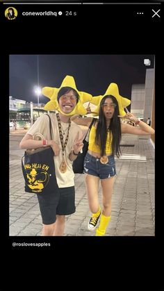 two people dressed in yellow hats and shorts