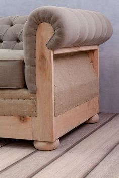 a couch sitting on top of a wooden floor