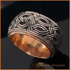 Celtic symbols and knots are still an important part of a Irish culture today. With no beginning and no end, Celtic knots are known as symbols of eternity or infinity. This custom made silver Celtic wedding ring represents everlasting love, friendship or loyalty. The ring is made of oxidized silver. It is measures 11 mm in width. The profile of the ring is domed with brushed and oxidized texture. The interior of the ring can be in silver color as well as yellow or rose gold plated. The ring is h Irish Promise Rings Celtic Knots, Irish Wedding Rings Claddagh Mens, Celtic Eternity Ring, Gold Celtic Rings, Celtic Silver Rings For Men, Celtic Knot Sterling Silver Cufflinks, Handmade Wedding Band, Celtic Wedding Bands, Handwritten Text