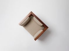 an overhead view of a chair and ottoman on a white background with the seat up