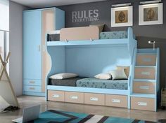 a child's bedroom with bunk beds and drawers