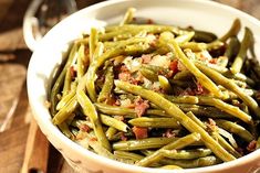 green beans with bacon in a white bowl