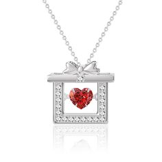 This gift box pendant is the perfect finishing touch to any look! The CZ-studded red heart is the ideal way to add shine to your favorite outfit. Available in rose gold and silver tones. Square Jewelry, Rose Gold Earrings Studs, Zircon Necklace, Silver Necklaces Women, Rose Gold Studs, Wedding Party Jewelry, Moonstone Pendant, Female Fashion, Rose Gold Earrings