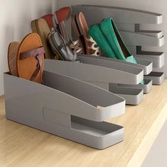 there are many pairs of shoes in the holder