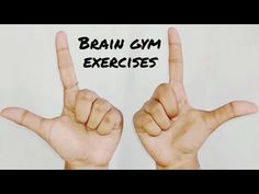 two hands are making the peace sign with their fingers, and the words brain gym exercises written on them