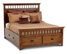 a wooden bed with drawers underneath it