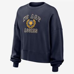 The Aggies hold a unique place within the cultural fabric and tapestry of North Carolina A&T, personifying the promise of representation for generations to come. Honor your school with this fleece sweatshirt. Crew Neck Tops For College Events In Fall, Sporty Tops For College Events In Fall, Casual Tops For College Events In Fall, Casual Fall Tops For College Events, Nike Collegiate Tops For Fall, Nike Cotton Sweater For Fall, Fleece Tops For Campus In Fall, Nike Sweatshirt With Ribbed Cuffs For College, Fall Campus Fleece Tops