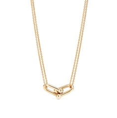 The unique style of elegance. Simple clavicle necklace with interlocks hang on a double chain giving it a sophisticated look. A modern necklace for the modern woman. Wear it by itself, or layered. Details 18K Gold Plated on 925 Sterling Silver Chain: 15" + 2.3" extender Delivered in Poppy Mae custom jewelry boxes ready to be gifted Avoid contact with any chemicals or alcohol. Please refer to our care guide for more details. Luxury Minimalist Women's Chain Necklace, Luxury Minimalist Chain Necklace, Luxury Minimalist Chain Necklace For Women, Luxury Formal Chain Necklace For Women, Luxury Necklaces With Adjustable Length As Gift, Luxury Minimalist Necklace With Adjustable Chain, Luxury Everyday Clavicle Chain Necklace, Luxury Minimalist Charm Necklace With Adjustable Chain, Luxury Adjustable Necklace For Women