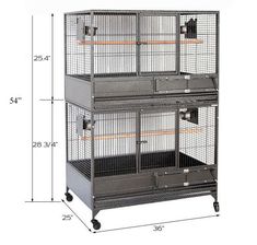 the large bird cage has three levels and is on wheels with measurements for each section