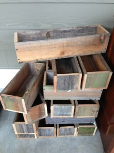 several wooden boxes stacked on top of each other