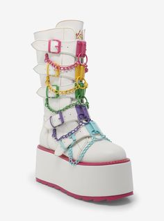 Get yourself a pair of boots that are as unique as you! This white pair of platform boots features buckle strap detailing down the front with colorful hardware and chain detailing. Back zipper closure.Listed in women's sizes.Platform: 3''Heel: 6" Vegan patent leather upper; rubber soleImported Hot Topic Shoes, Yru Shoes, Silly Clothes, Rainbow Outfit, Dress Design Sketches, Crazy Shoes, Character Outfits, Looks Vintage, Platform Boots