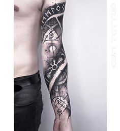 a man's arm is covered in tattoos and has an abstract design on it