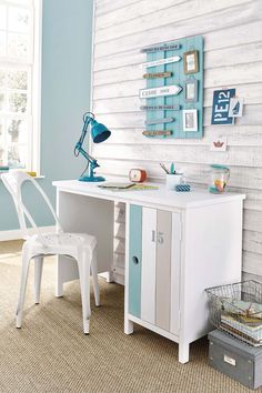 a white desk and chair in a room