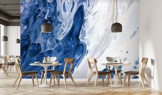 a restaurant with blue and white marble wallpaper