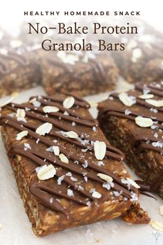 no - bake protein granola bars with chocolate drizzled on top