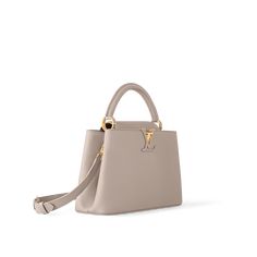 LOUIS VUITTON® - Capucines Mm - Galet Casual Elegant Style, Louis Vuitton Capucines, Monogram Bag, Buckle Shoes, Louis Vuitton Official, Iconic Bags, Fashion Jewelry Earrings, Wallet Chain, Lv Bag