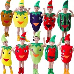 children in costumes made to look like fruits and vegetables, with chinese characters on them