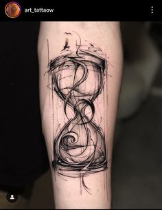 a black and white tattoo with an hourglass on the arm, which has been drawn by