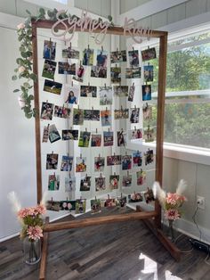 a wooden frame with pictures and flowers on it in front of a window that says spring fling