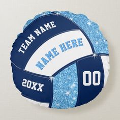 a blue and white volleyball ball with name on it