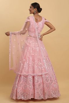 Pastel pink lehenga with attached can-can, all over Mughal pattern, tonal thread, stone and mirror embroidery. Paired with 3D floral applique work padded blouse and bordered dupatta. - Aza Fashions Pink Cutdana Set For Party, Pink Cutdana Party Sets, Pink Party Sets With Dori Work, Pink Party Wear Choli With Cutdana, Pink Semi-stitched Sets For Navratri, Pink Dori Work Sets For Navratri, Fitted Pink Traditional Wear With Sheer Dupatta, Pink Fitted Set For Navratri, Pink Fitted Party Wear Set