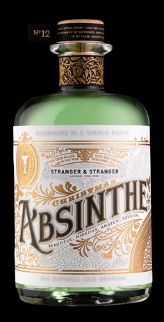 a bottle of absinte on a black background