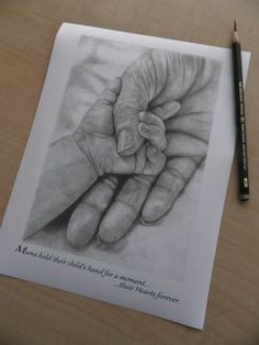 a pencil drawing of two hands holding each other