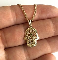 10K SOLID GOLD HAMSA NECKLACE .REAL 10K GOLD (NOT PLATED OR FILLED)  18” LONG 10K REAL GOLD CHAIN.  10K GOLD HAMSA PENDANT .--2.6 GR —  FOR GOOD LUCK,PROTECTION,HEALTH AND ANY KIND DIFFICULTY.  PENDANT SIZE : 25 x15mm  ---MADE IN USA-BEST QUALITY---  FREE GIFT BOX Hamsa Necklace Gold, Gold Chain Pendant, 10k Gold Chain, Real Gold Chains, Fatima Hand, Hand Pendant, Good Luck Bracelet, Gold Hamsa, Hamsa Pendant