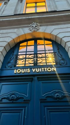 the front door to louis vuitton in paris