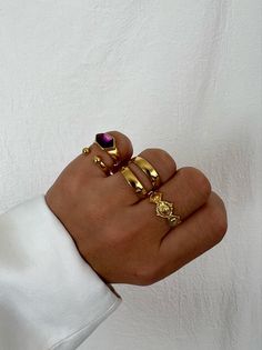 Introducing our exquisite handmade Gold rings! Our four stunning Stacking Rings are the ultimate accessory to add elegance and luxury to any outfit. The set includes a regal purple enamel stone ring and a chic open ring with two stunning beads. You'll also love our unique interconnected ring and smaller Boho-inspired ring, making for an irresistible combination. Check out the second photo to easily order the rings by number. Elevate your style with our handmade Gold rings, exclusively available Women Rings Gold, Gold Rings Women, Stackable Gold Rings, Rings Stone, Handmade Gold Ring, Jewelry Stacking, Ring Stacks, Gold Rings Stackable, Rings Women